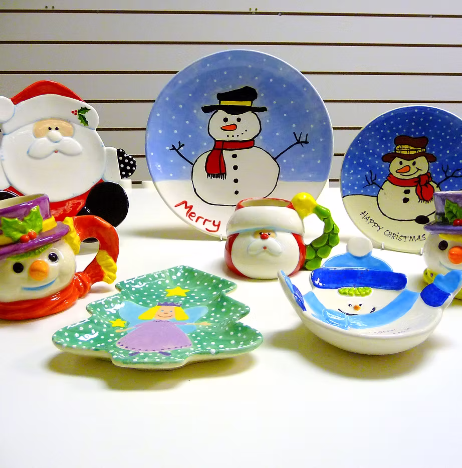 Finished ceramic pieces displayed on shelves